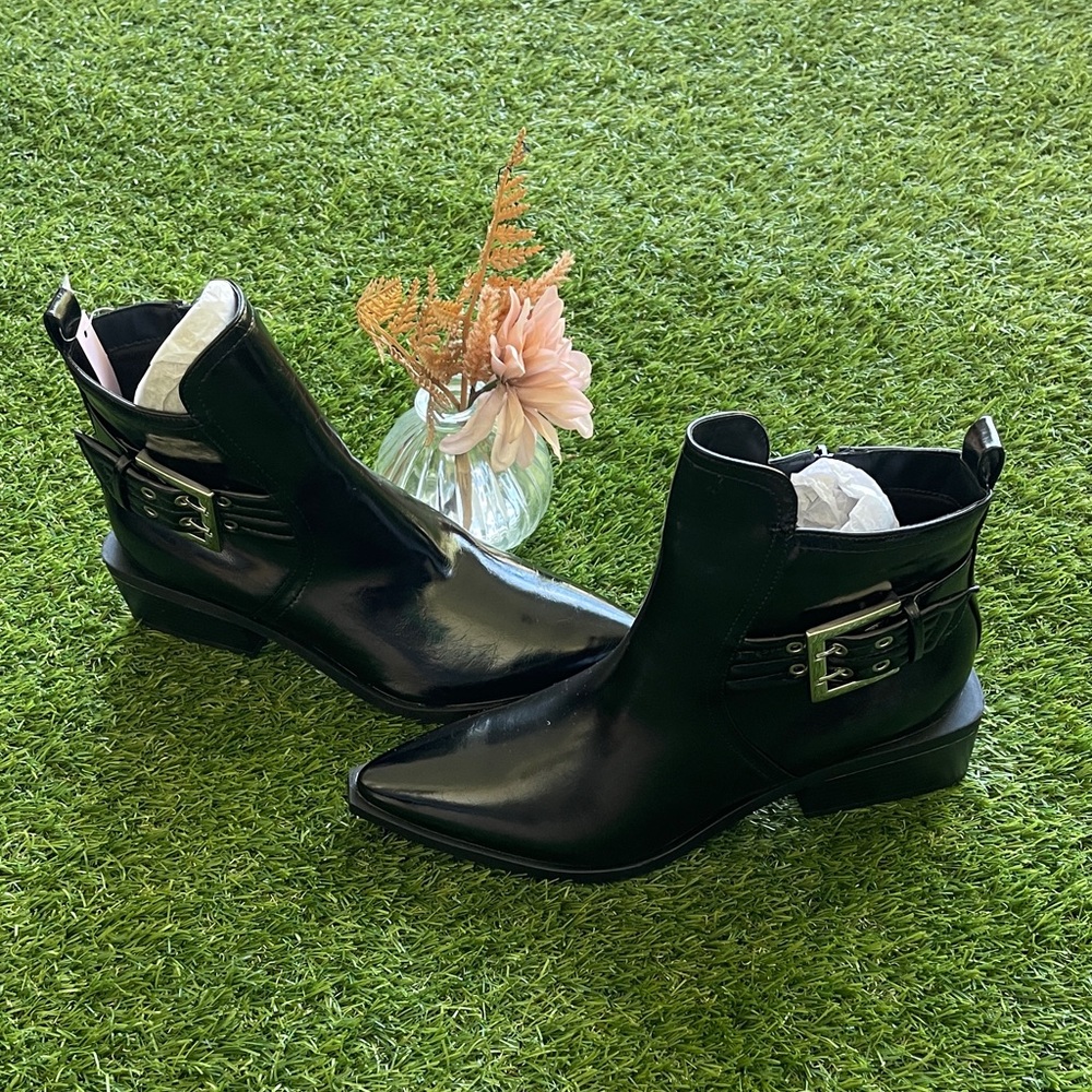 Sleek Black Ankle Boots with Buckle Accent
